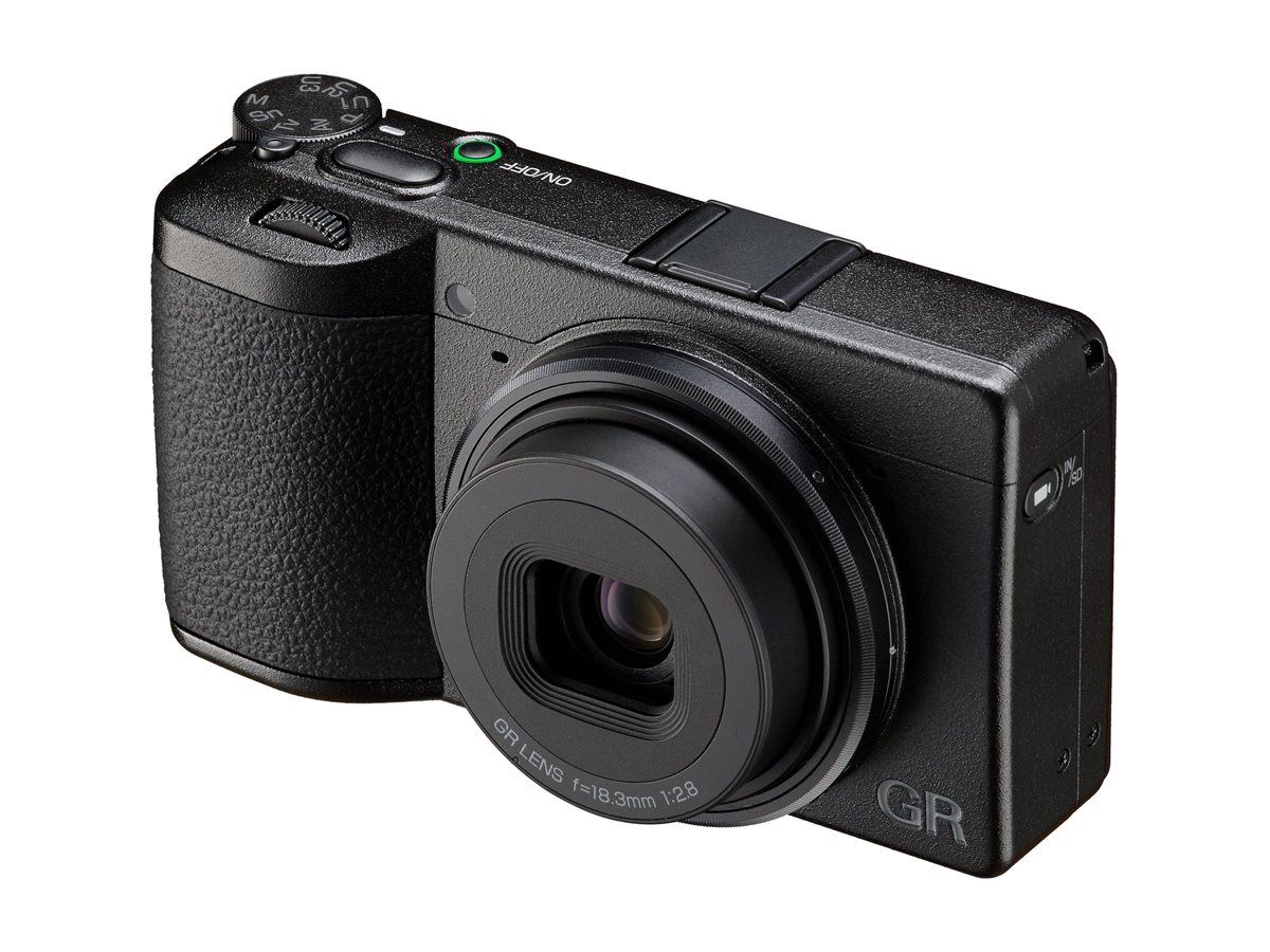 Ultra-compact Ricoh GR IV pocket camera in matte black, known for its slim profile and high-quality APS-C sensor.